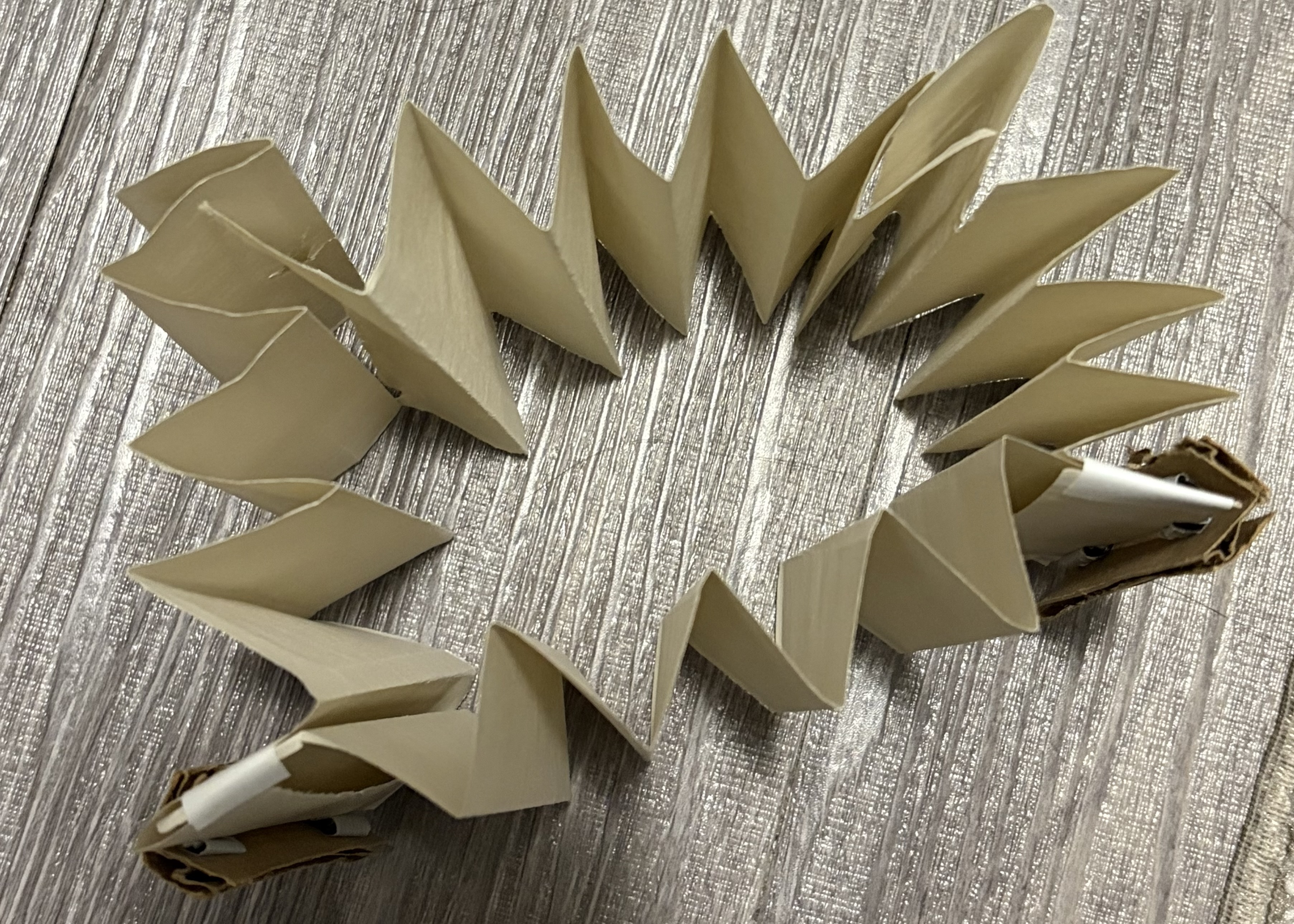 Testing the cardboards sturdiness and seeing how the pieces align when connected together (whether a rectangle is formed or not)